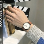 Homens Mulheres Estilo Simples Lazer Assista amantes da moda Estilo Quartz imitação de couro pulseira de pulso