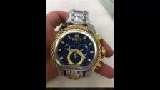 Relógio Magnum 26687 Prata e Dourado com Fundo Azul