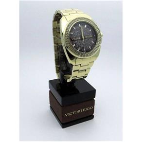 Relógio Victor Hugo Feminino Dourado Grande Fundo Marrom Brilho VH10103LSG/12M