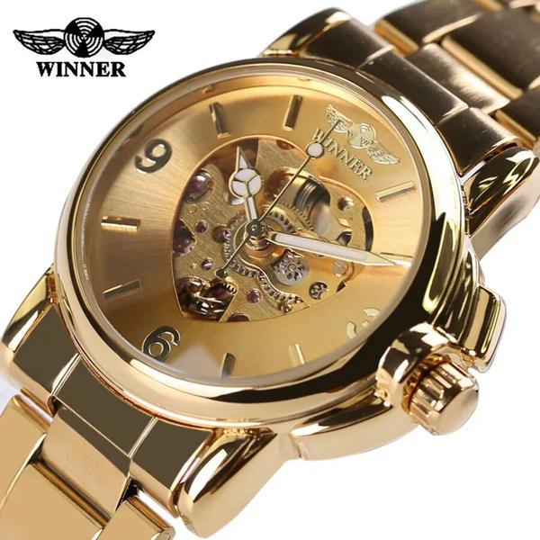 Relógio Winner,automático e Corda,feminino,modelo H203l, Pulseira Aço Dourado, Fundo Dourado Coração