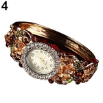 Ficha técnica e caractérísticas do produto Luxo Feminina oco Flor Rhinestone Oval Dial Quartz relógio de pulso Pulseira